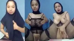 Lusi Berjilbab Hitam Menggairahkan, Mengocok Memek Basah Berdesah-desis